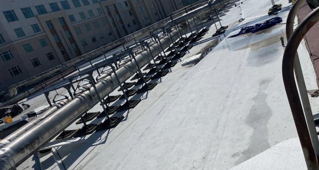 Storm damaged commercial roof.