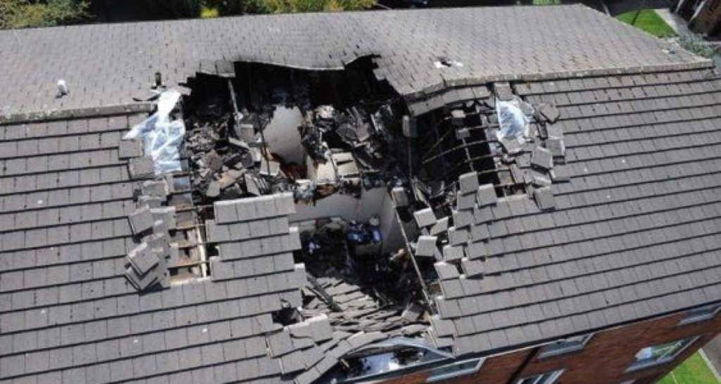 Totally damaged shingle roof.