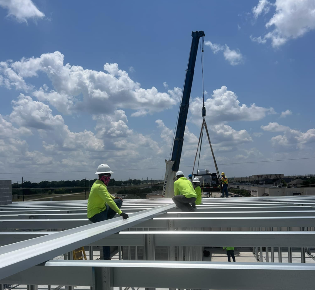 Commercial metal roof installation.