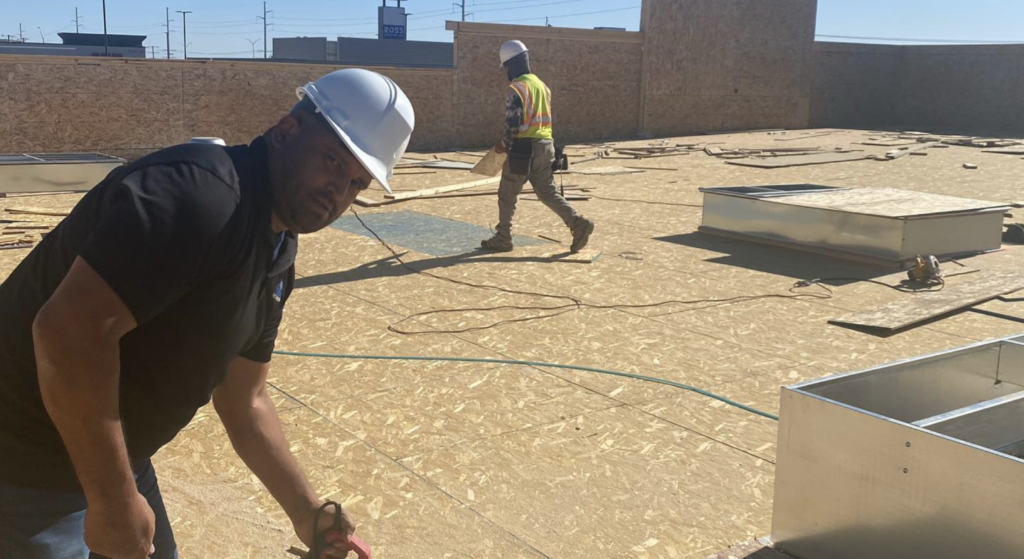 Commercial roof installation in progress.