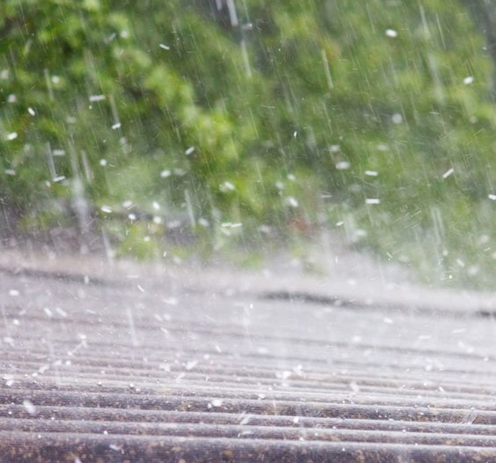 Hail falling on roof.